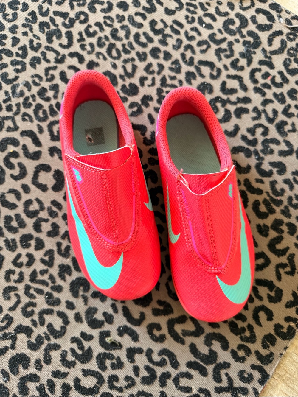 Nike Kids Bright Red Indoor Soccer Cleats with Teal Swoosh